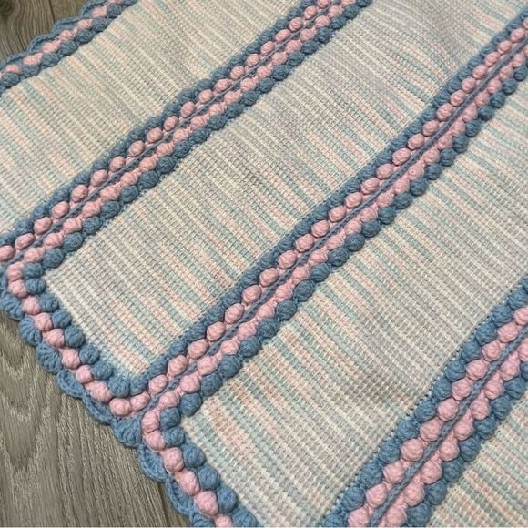 Hand Knitted Baby Blanket Blue and pink scalloped hem and pom pom edges. - Picture 2 of 6